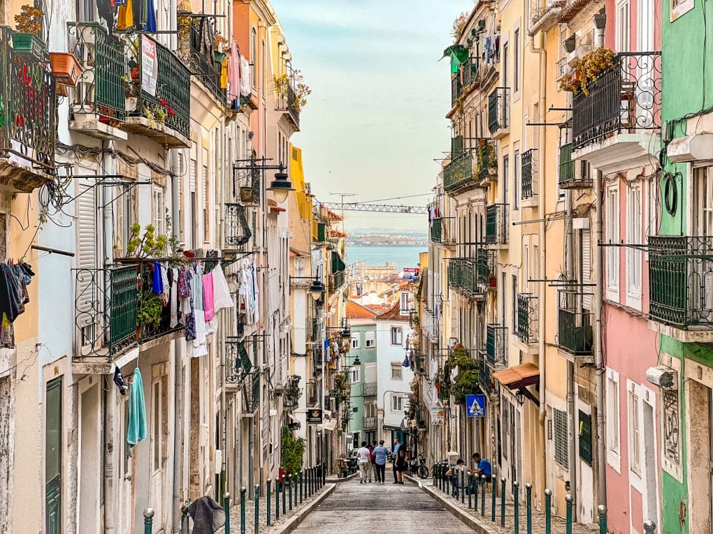 city streets and ocean in background: solo travel in lisbon