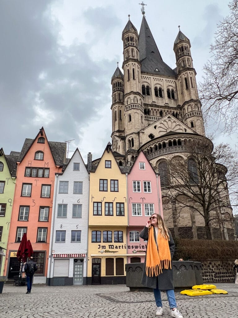 colorful buildings and church in cologne